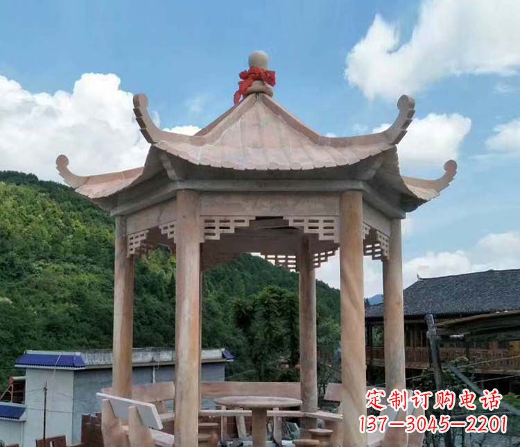 海南一流的公园晚霞红六角石雕凉亭