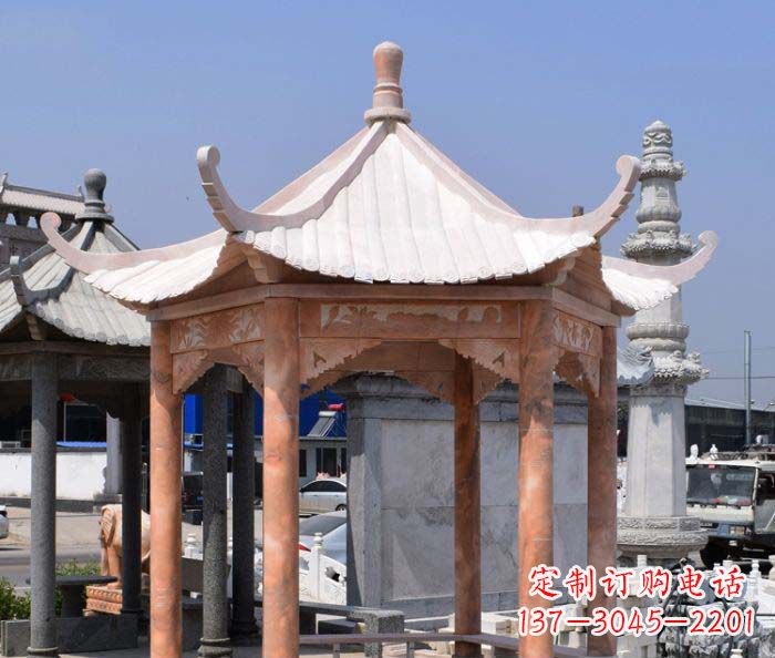 海南公园晚霞红石雕凉亭