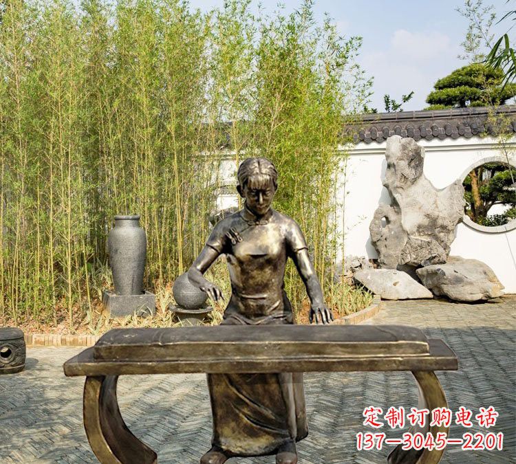 海南铜雕弹古筝人物
