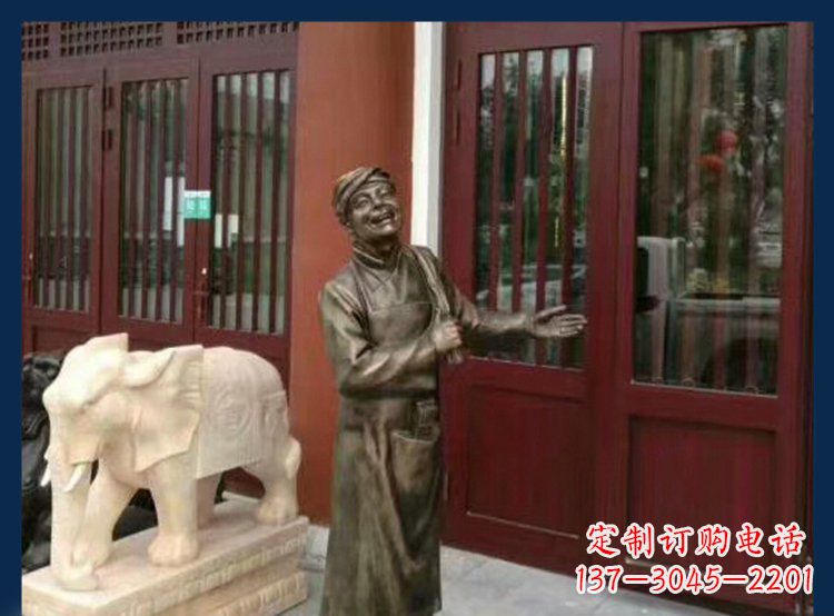 海南铜雕店小二酒店迎宾人物雕塑